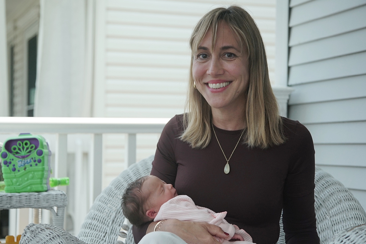 Dr. Andrea Cercek holding newborn Mya Grace Bonito. 