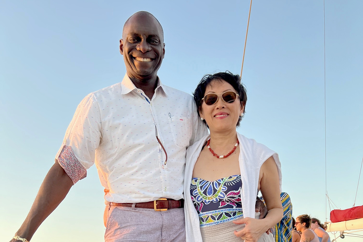 See Dr. Elenitoba-Johnson and his wife, Dr. Megan So-Young Lim, on a boat.