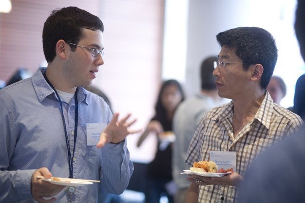 First-year PhD student Daniel Marks (left) and faculty member Zhirong Bao at the Welcome Reception for PhD students.