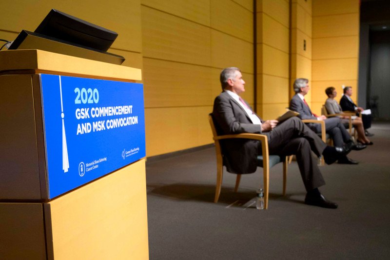 MSK leadership on the stage in the Zuckerman Research Center auditorium.