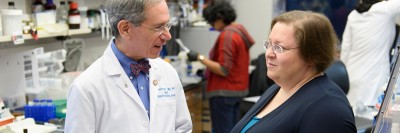 MSK clinical geneticist Kenneth Offit and genetic counselor Yelena Kemel pictured in a laboratory