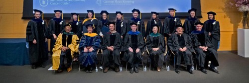 GSK Graduates and MSK Leadership pose on the stage