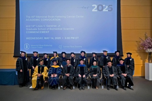 GSK Graduates and MSK Leadership pose on the stage