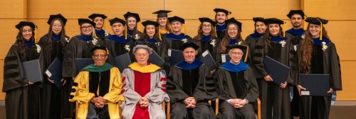 GSK Graduates and MSK Leadership pose on the stage